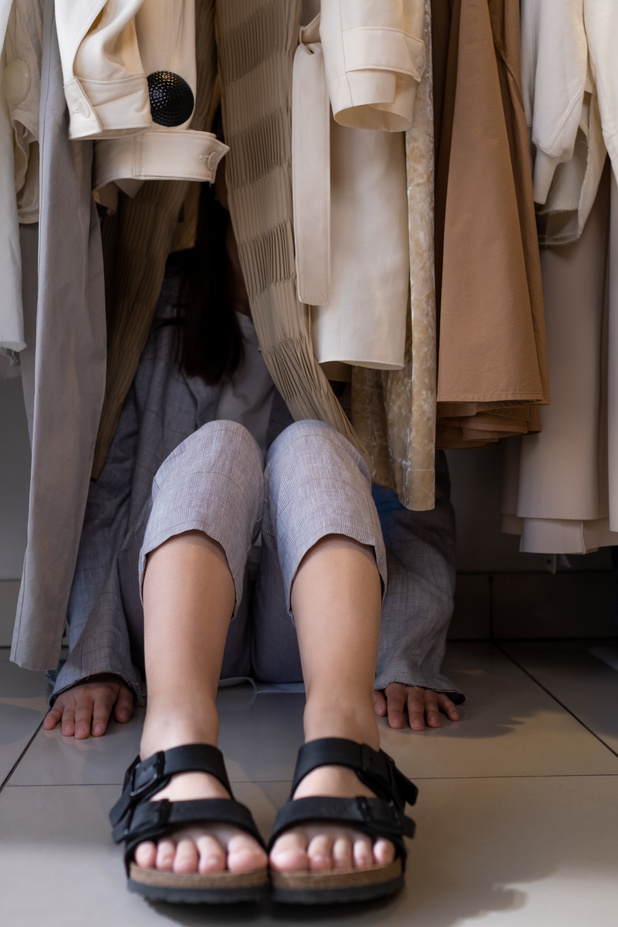 Girl Hiding Inside a Closet